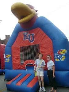 Carolyn and Jane Staff the bouncy house